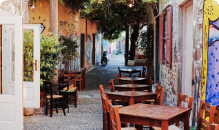 Ermou Street stone-paved market lane between two harbors, Mytilene