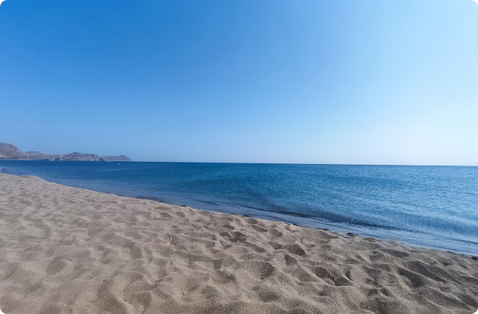 Skala Eressos dark sand beach and clear water, southwest Lesvos